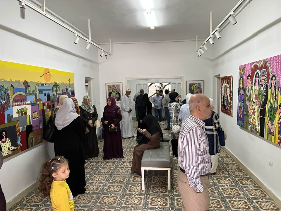 People looking at art during an opening