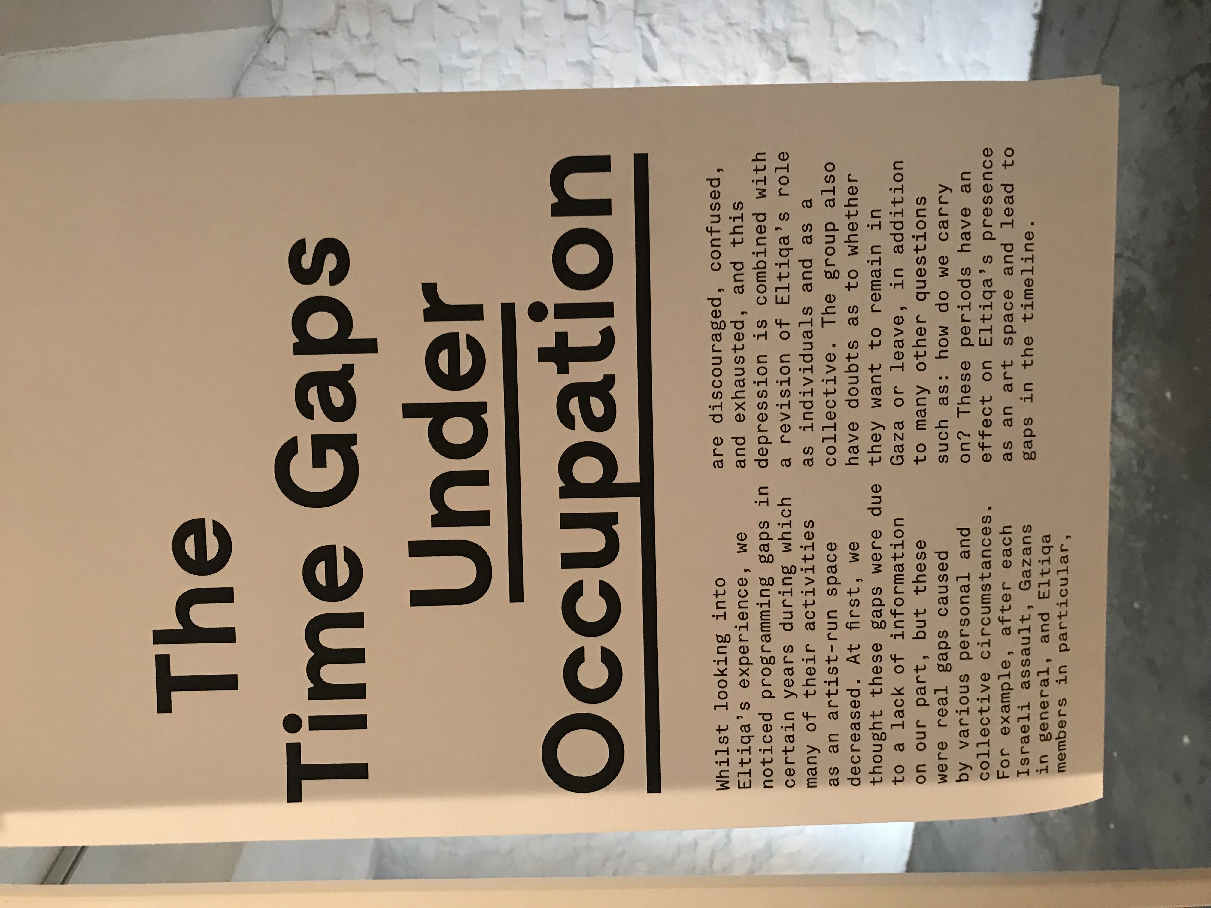Wall text: 'The Time Gaps Under Occupation'